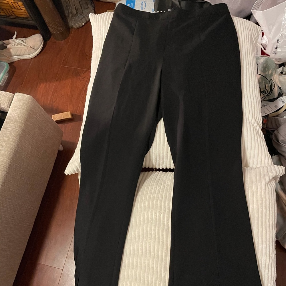 Black pants with front slits